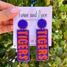 Load image into Gallery viewer, GameDay Earrings, College Football Earrings, Team Earrings, GameDay Outfit, Clemson earrings, Clemson tigers earrings, Clemson earrings, game day earrings, team game, Purple Tigers earrings, game day outfit, football earrings, college gifts, Clemson Tigers Beaded earrings, tigers earrings, college team gifts, Clemson tigers bead earrings, team beaded earrings, tigers beaded earrings, gameday outfit, Clemson beaded earrings, South Carolina earrings, South Carolina Tigers football 