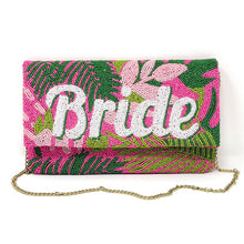Load image into Gallery viewer, Fashion portrait featuring a woman holding a bright beaded bride clutch, paired with yellow tassel earrings and a chic summer outfit.