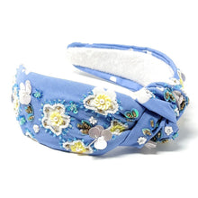 Load image into Gallery viewer, Handmade statement headband with soft blue fabric, floral appliqués, sequins, and intricate artisan embroidery details.