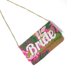 Load image into Gallery viewer, Colorful bridal pouch with intricate beadwork, tropical floral details, and “Bride” text, perfect for wedding celebrations.