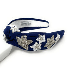 Load image into Gallery viewer, Navy blue knot headband adorned with hand-beaded silver and white butterfly embellishments for an elegant statement look.