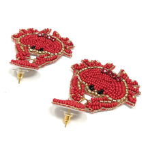 Load image into Gallery viewer, Handmade nautical crab earrings with bold red bead embroidery, gold trim accents, and fun summer coastal style.