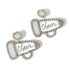 Load image into Gallery viewer, Close-up fashion portrait showcasing handcrafted crystal statement earrings with intricate beadwork and shimmering details.