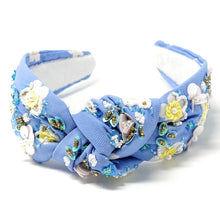 Load image into Gallery viewer, Light blue floral knot headband with hand-sewn sequins, beaded flowers, and delicate pastel embellishments for a whimsical look.